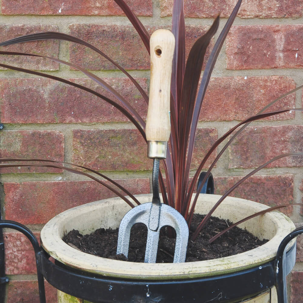 Using Hand Fork Kingfisher Wooden Handled Hand Fork – New Gardener